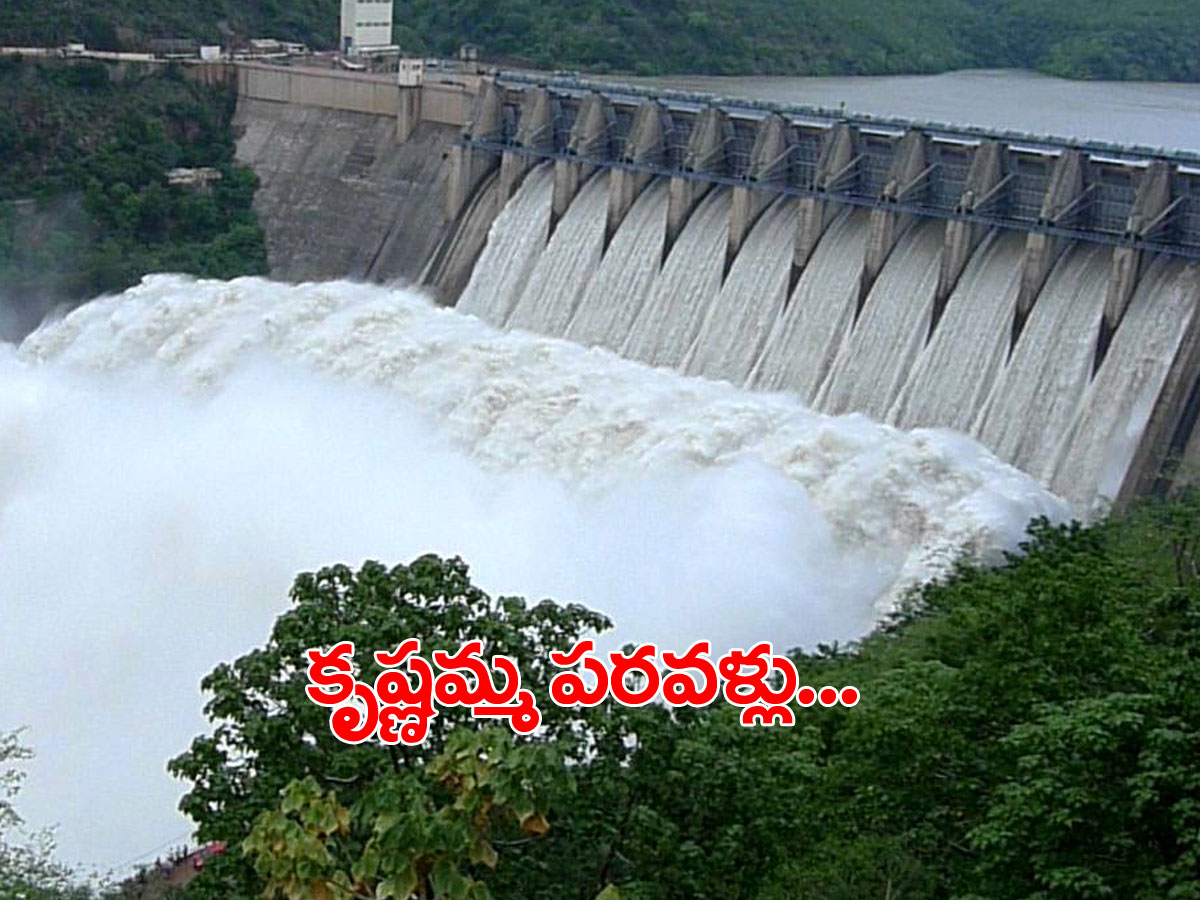 శ్రీశైలానికి భారీ వరద.. 10 గేట్లు ఎత్తివేత..