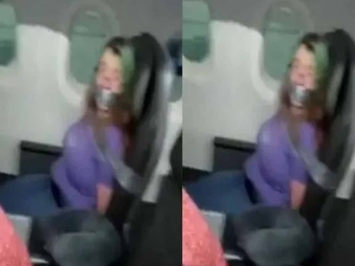 దారుణంః విమానంలో మ‌హిళ‌ను అలా క‌ట్టేశారు… ఎందుకంటే…