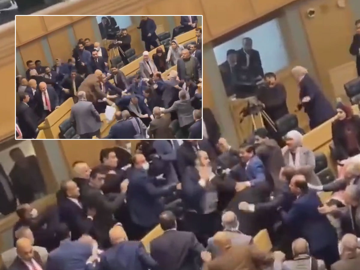 పార్లమెంట్‌లో ఎంపీల రచ్చ.. చొక్కాలు పట్టుకుని కొట్టుకొని..!