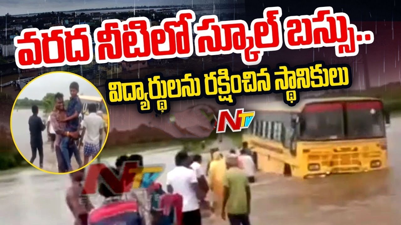 Bus Stuck in Flood: School bus stuck in flood.. Students are safe with the bravery of locals