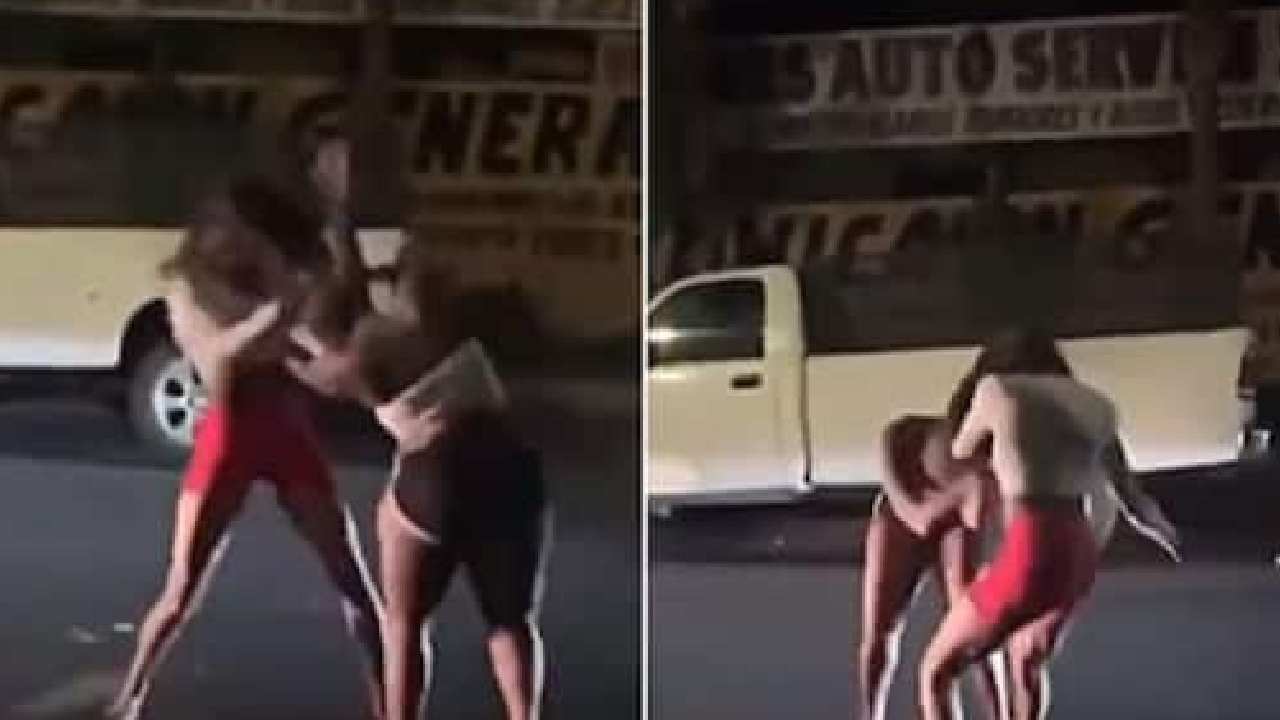 womens fight: నడిరోడ్డుపై లేడీస్ ఫైట్.. ఎవరూ తగ్గట్లేదుగా