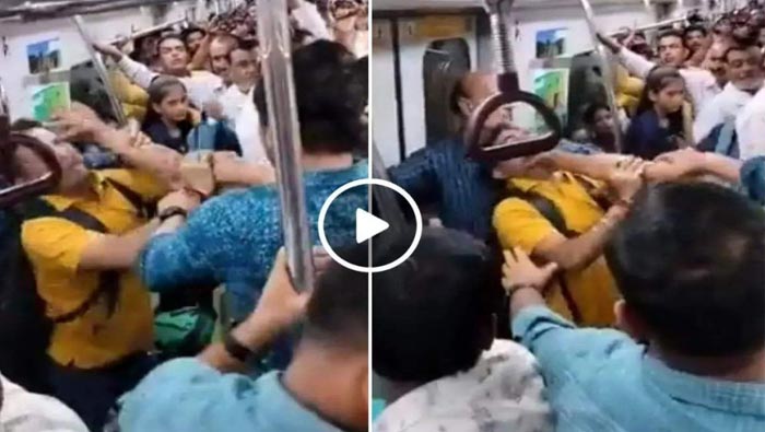 Delhi Metro : ఢిల్లీ మెట్రోలో తన్నుకున్న ఇద్దరు వ్యక్తులు.. వీడియో వైరల్..!