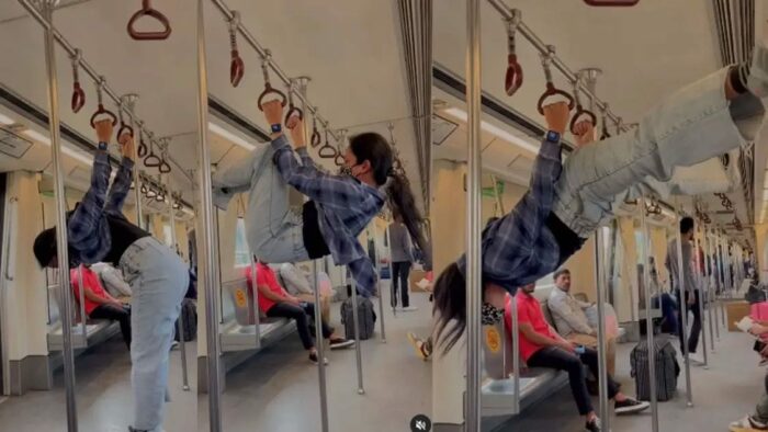 Viral Video: ఢిల్లీ మెట్రోలో యువతి విన్యాసాలు..దారుణంగా ట్రోల్స్ చేస్తున్న నెటిజన్స్..