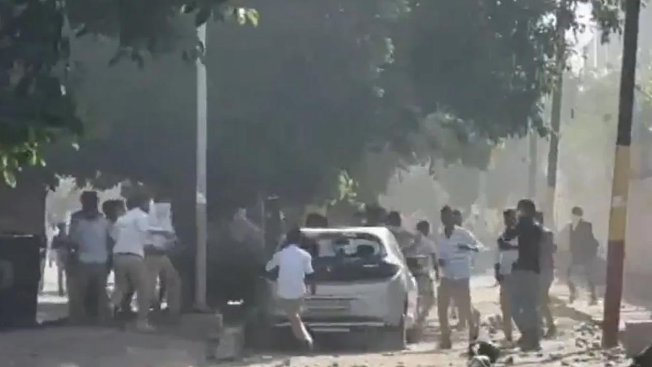 noida phase 2 protest violent workers set cars on fire salary hike