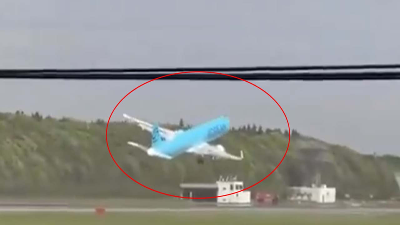 tokyo airport korean air flight go around strong crosswinds viral video